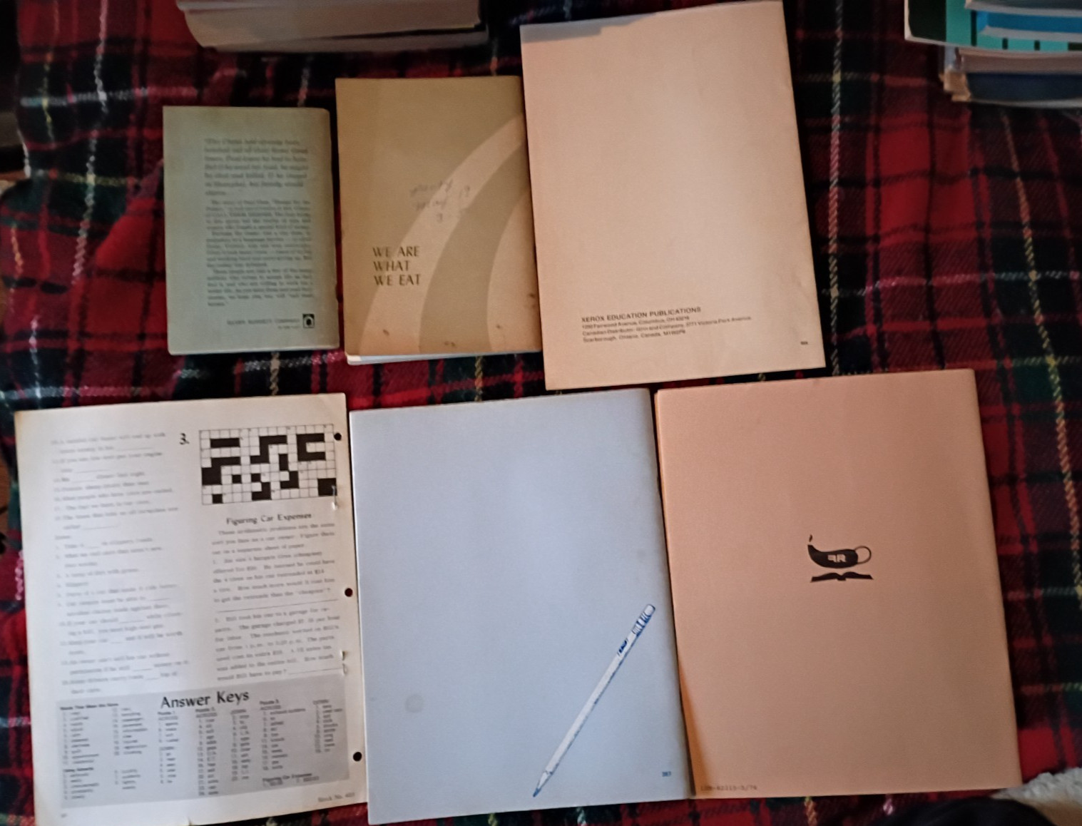 various vintage booklets: call them heroes, directions book, filling out forms,