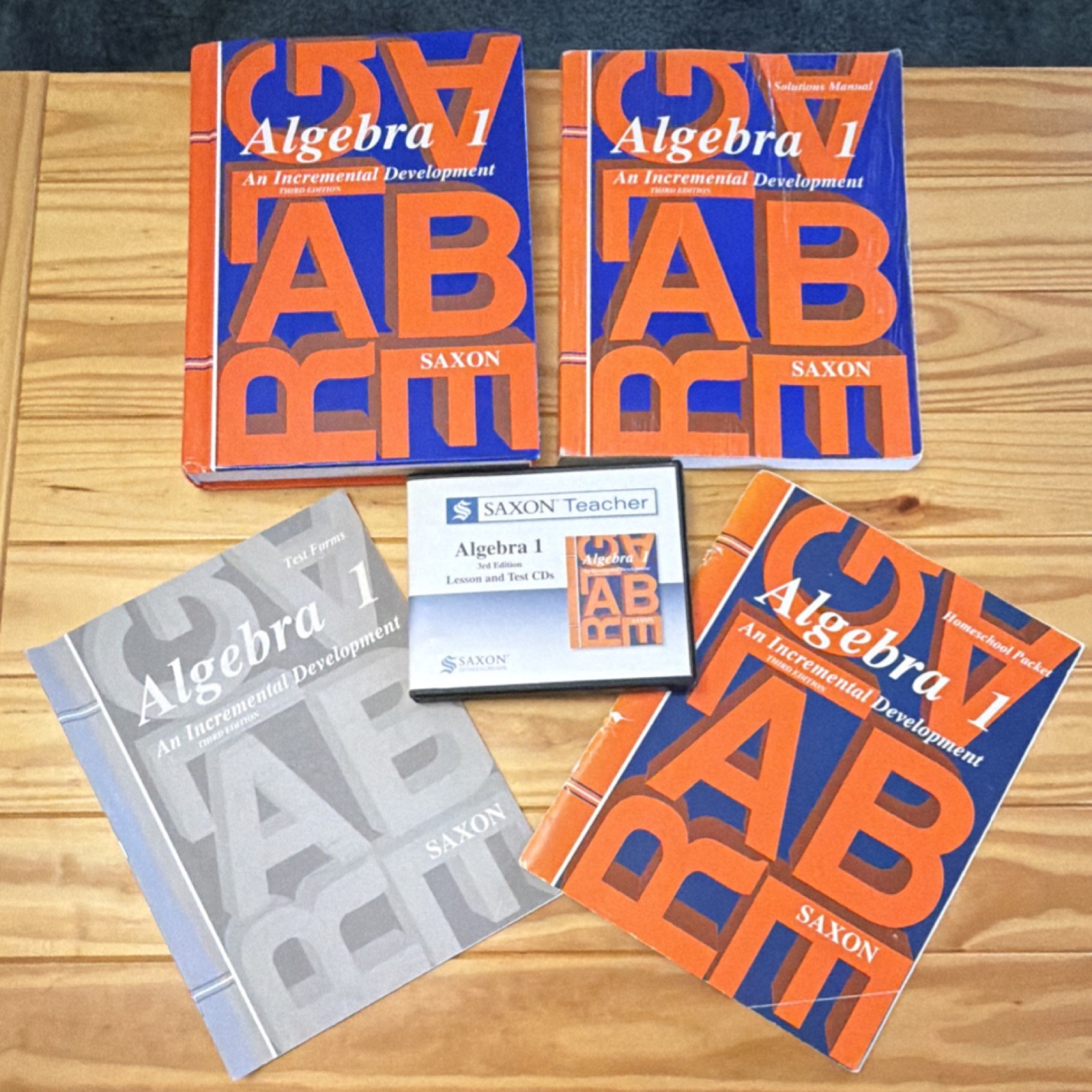 Saxon Algebra 1 Kit: Text, Solution Manual, Test Forms, Homeschool Packet, CDs